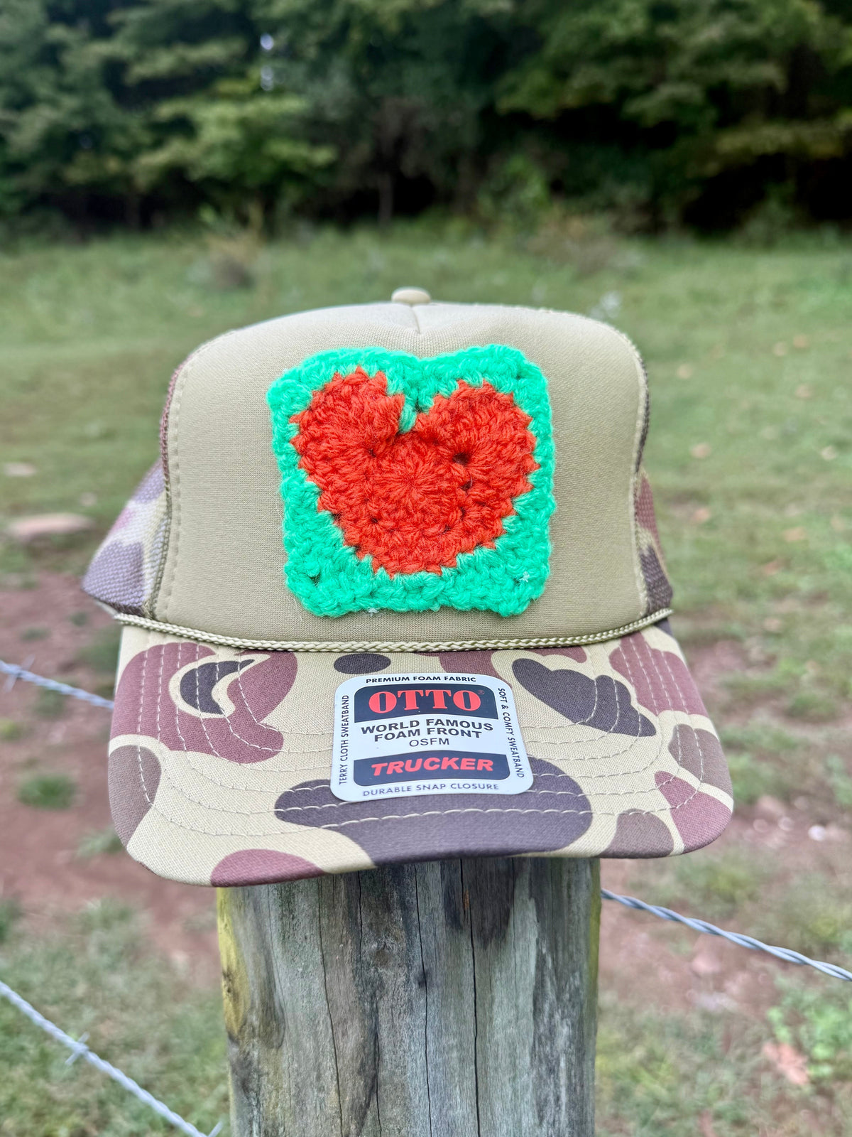 Camo Bill Trucker Hat with Orange Heart Crochet Patch