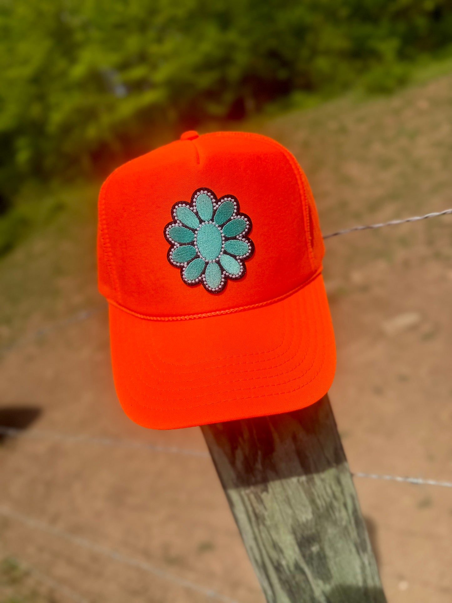 Orange Blaze Turquoise Blossom Trucker Hat