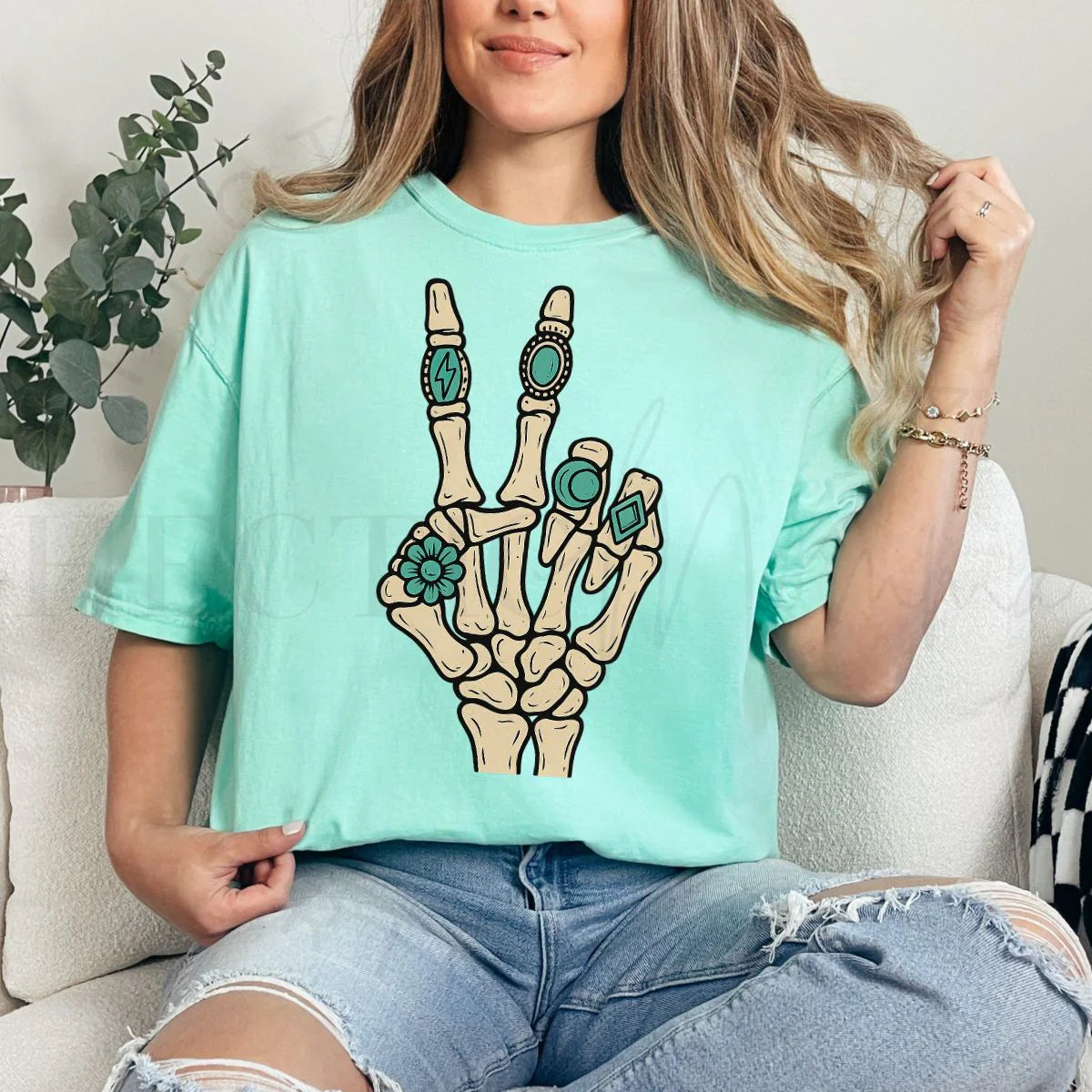 Turquoise Skelly Hand Tee