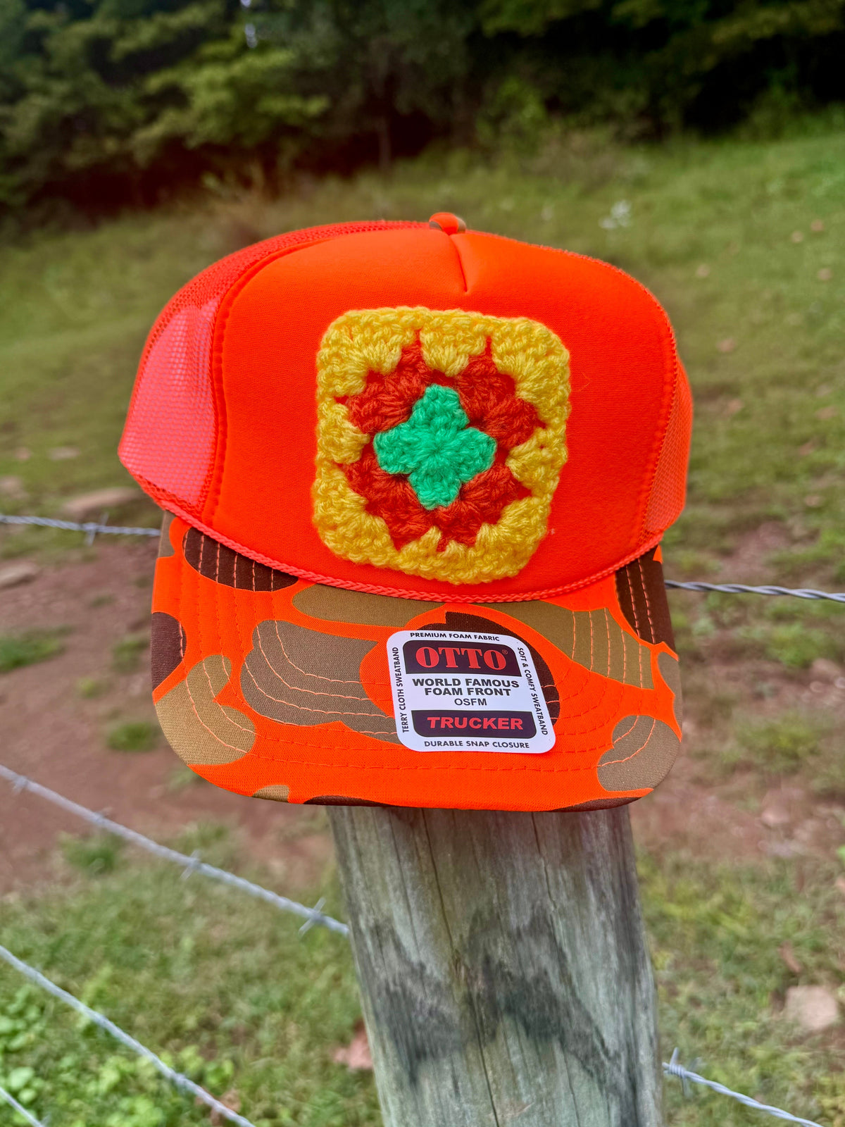 Neon Orange Camo Bill Trucker Hat with Colorful Crochet Patch